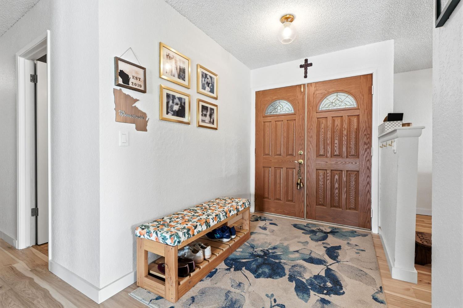 905 Redwood Lane Lemoore, CA 93245 - Photo 15 of 56 a bedroom with a bed and a window