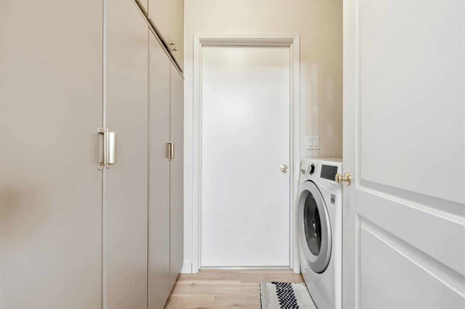 905 Redwood Lane Lemoore, CA 93245 - Photo 28 of 56 a view of utility room with washer and dryer