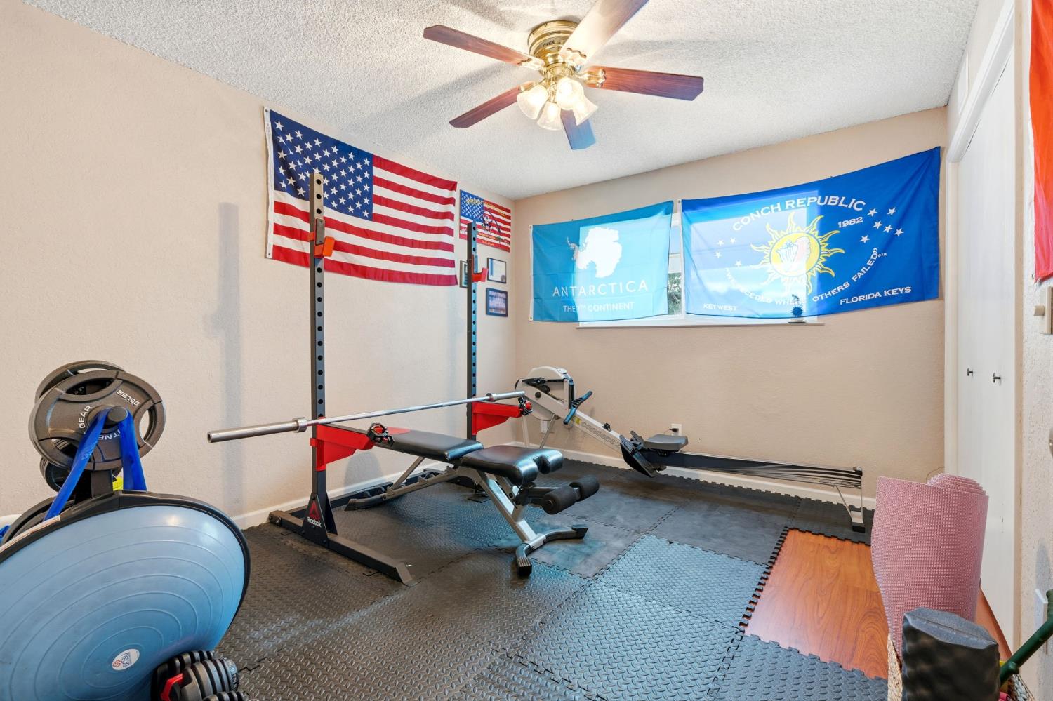 905 Redwood Lane Lemoore, CA 93245 - Photo 34 of 56 a room with furniture and a chandelier