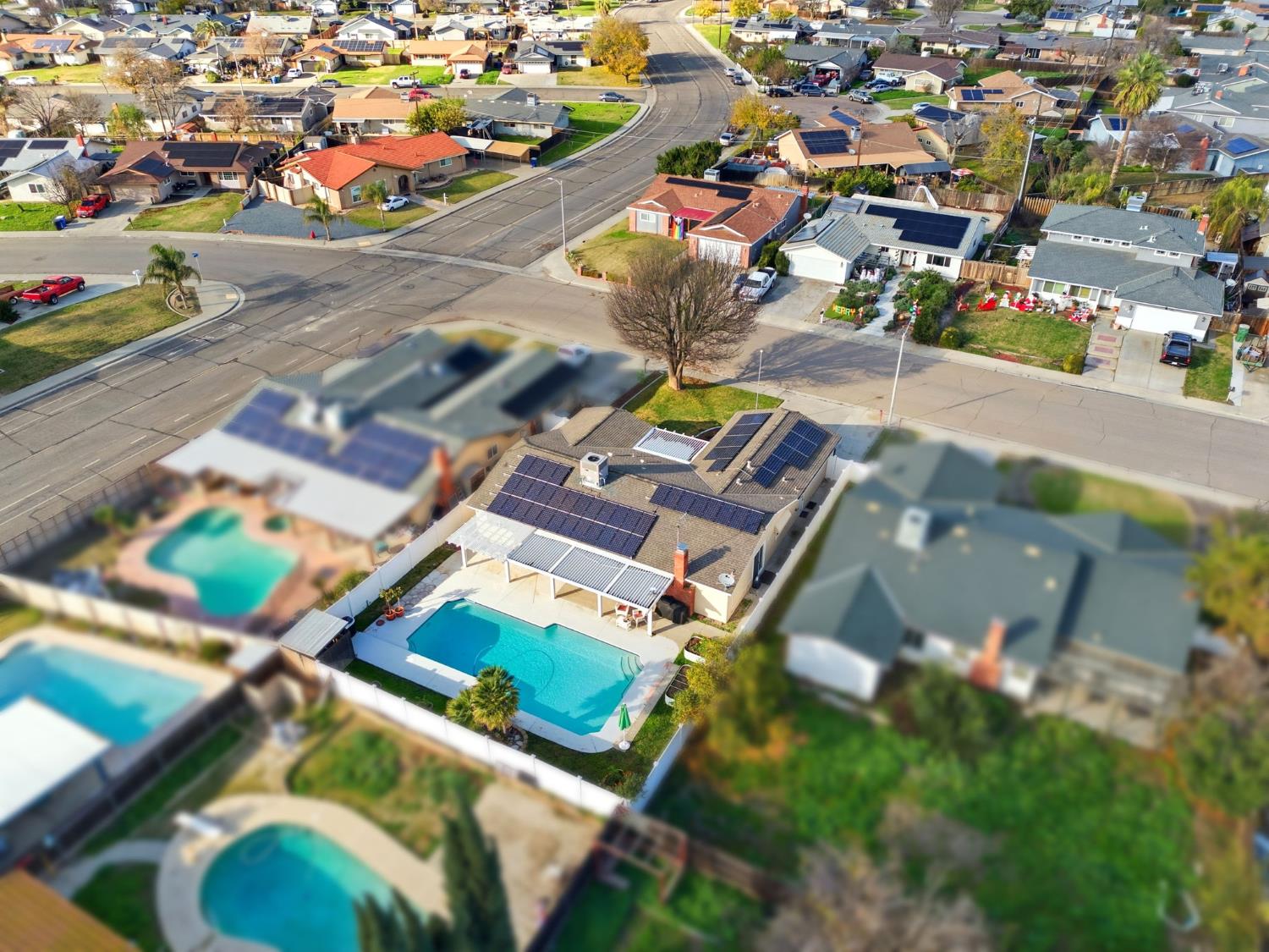 905 Redwood Lane Lemoore, CA 93245 - Photo 55 of 56 an aerial view of residential houses with outdoor space