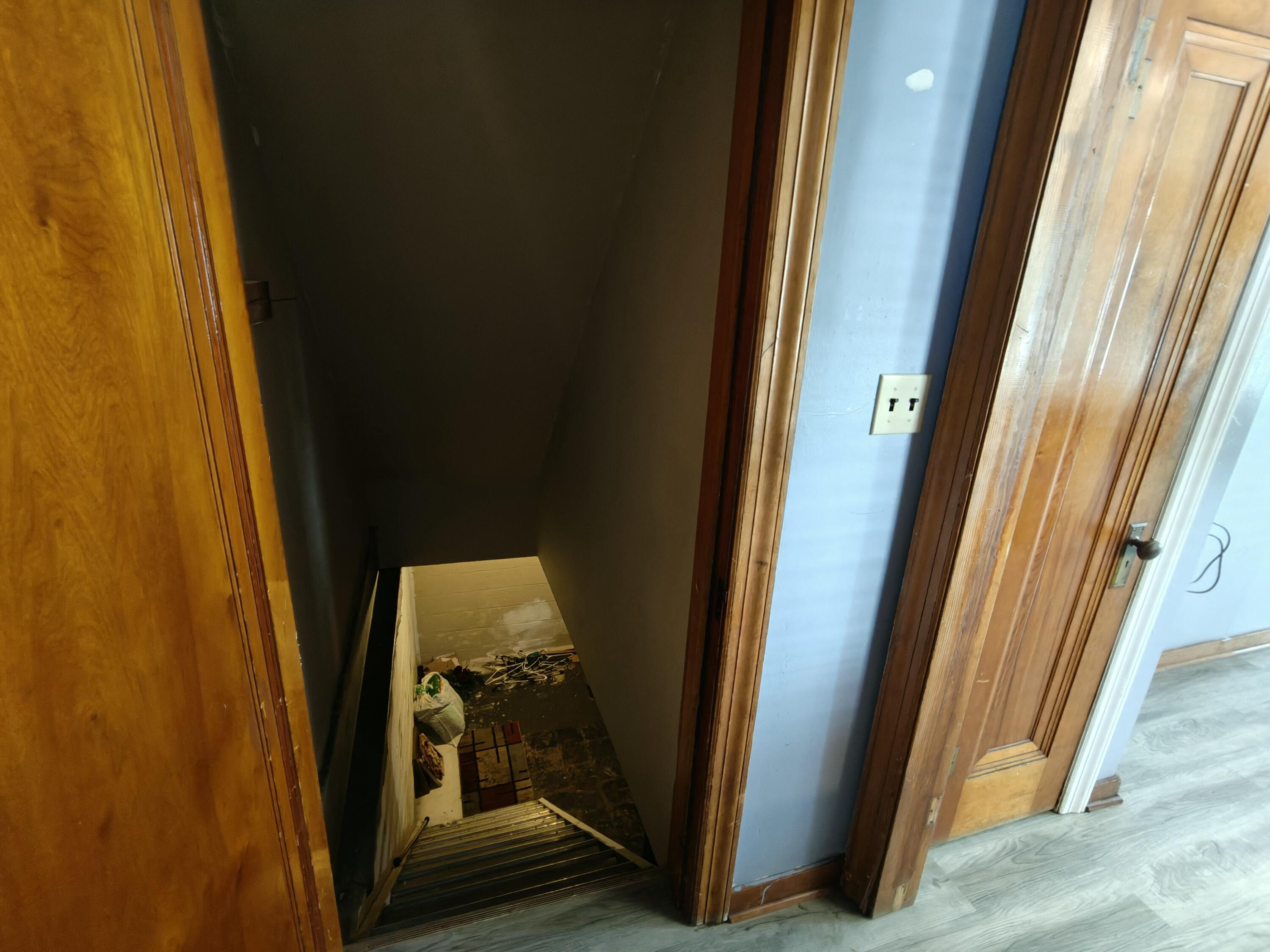 245 North Indiana Street Griffith, IN 46319 - Photo 18 of 30 a view of car door with wooden floor and door