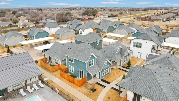 an aerial view of a house with roof deck