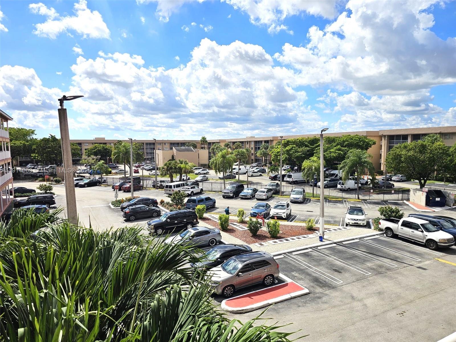 17350 Northwest 67th Avenue, Unit 303 Hialeah, FL 33015 - Photo 4 of 10 a city view with sitting space