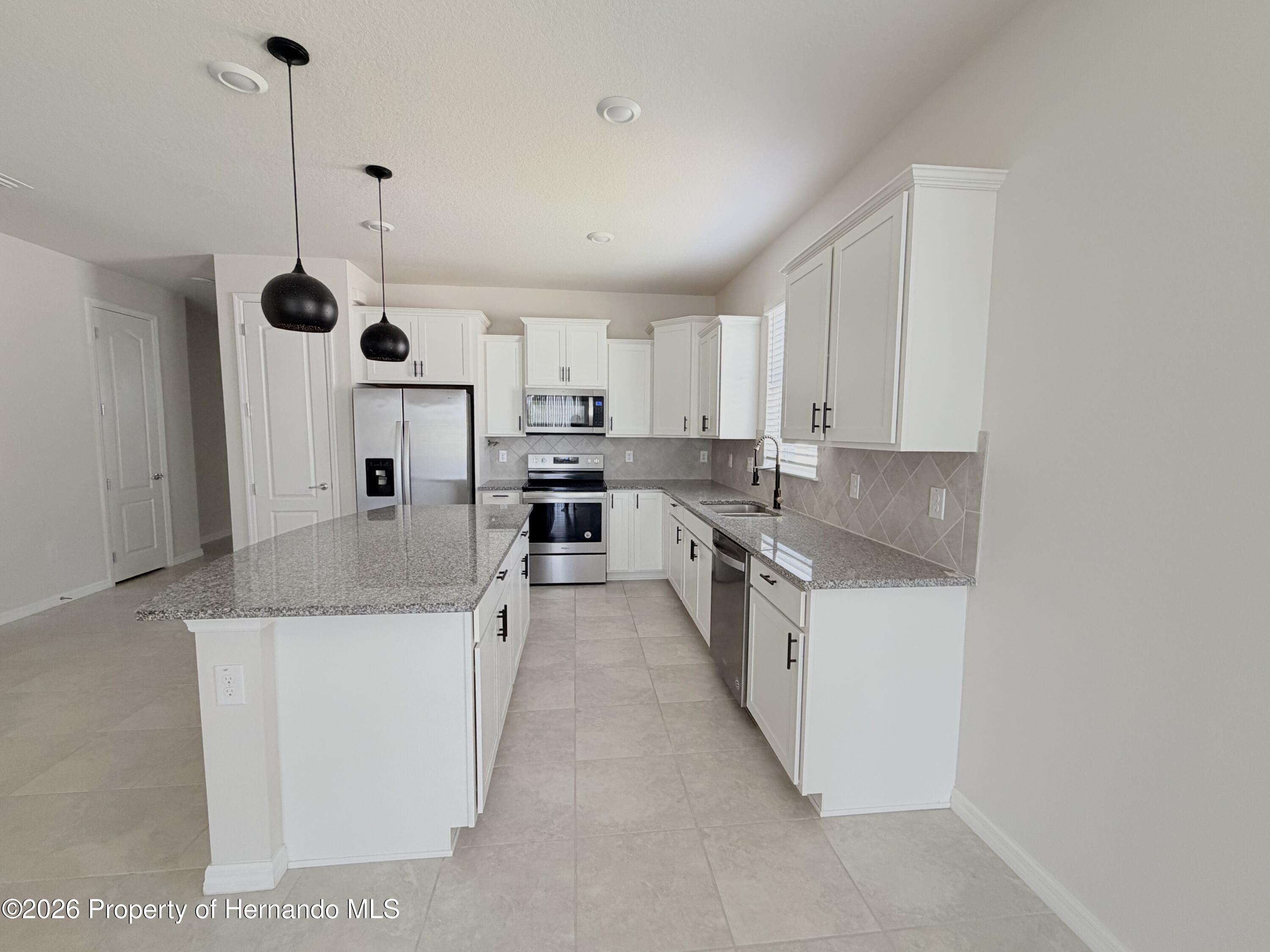 12792 Palapa Loop Spring Hill, FL 34610 - Photo 3 of 18