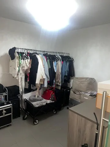 a bed room with a bed and a couch