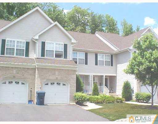 246 Hawthorne Road North Brunswick, NJ 08902 - Photo 1 of 4 front view of a house with a yard