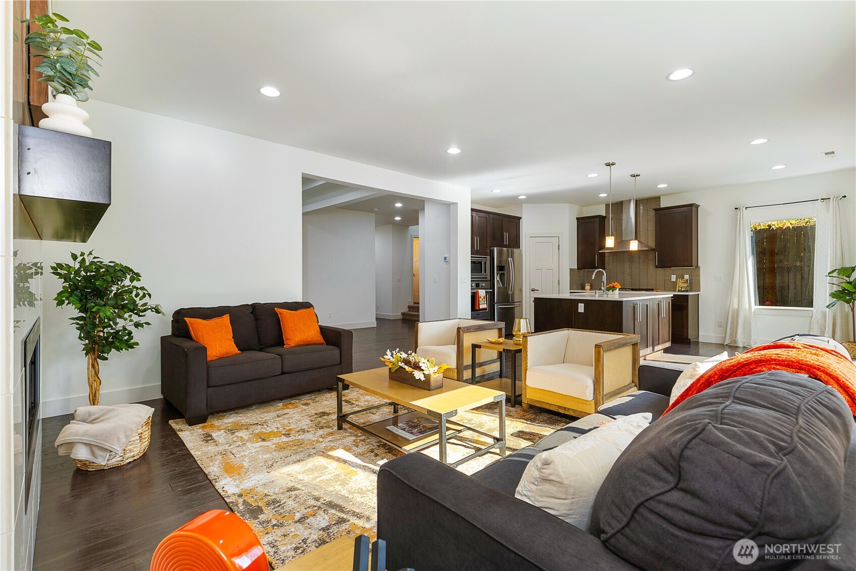 4214 223rd Place Southeast Bothell, WA 98021 - Photo 11 of 37 a living room with furniture and wooden floor