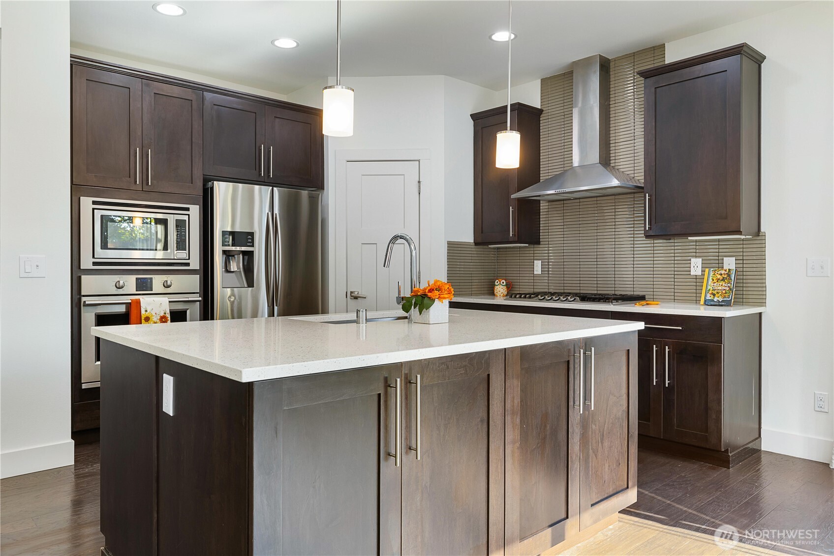 4214 223rd Place Southeast Bothell, WA 98021 - Photo 15 of 37 a kitchen with stainless steel appliances a sink stove and refrigerator