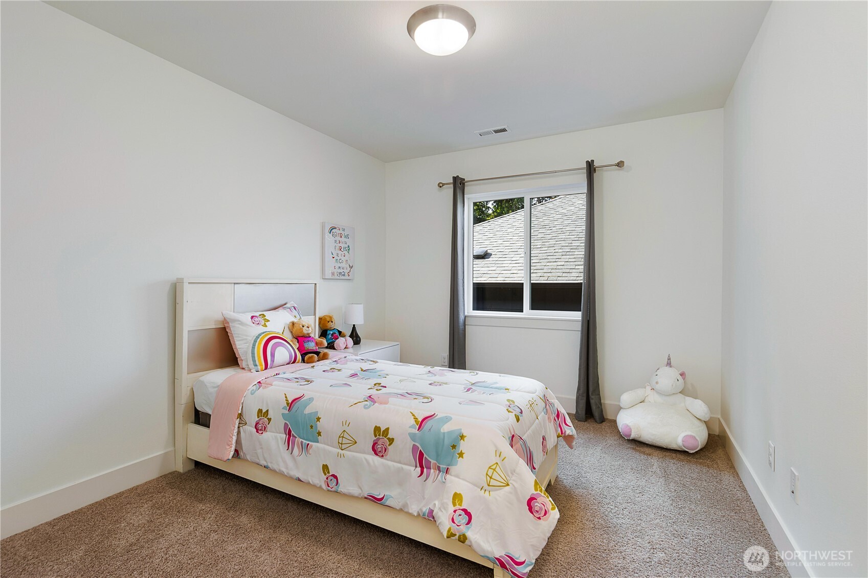 4214 223rd Place Southeast Bothell, WA 98021 - Photo 25 of 37 a bedroom with a bed and a window