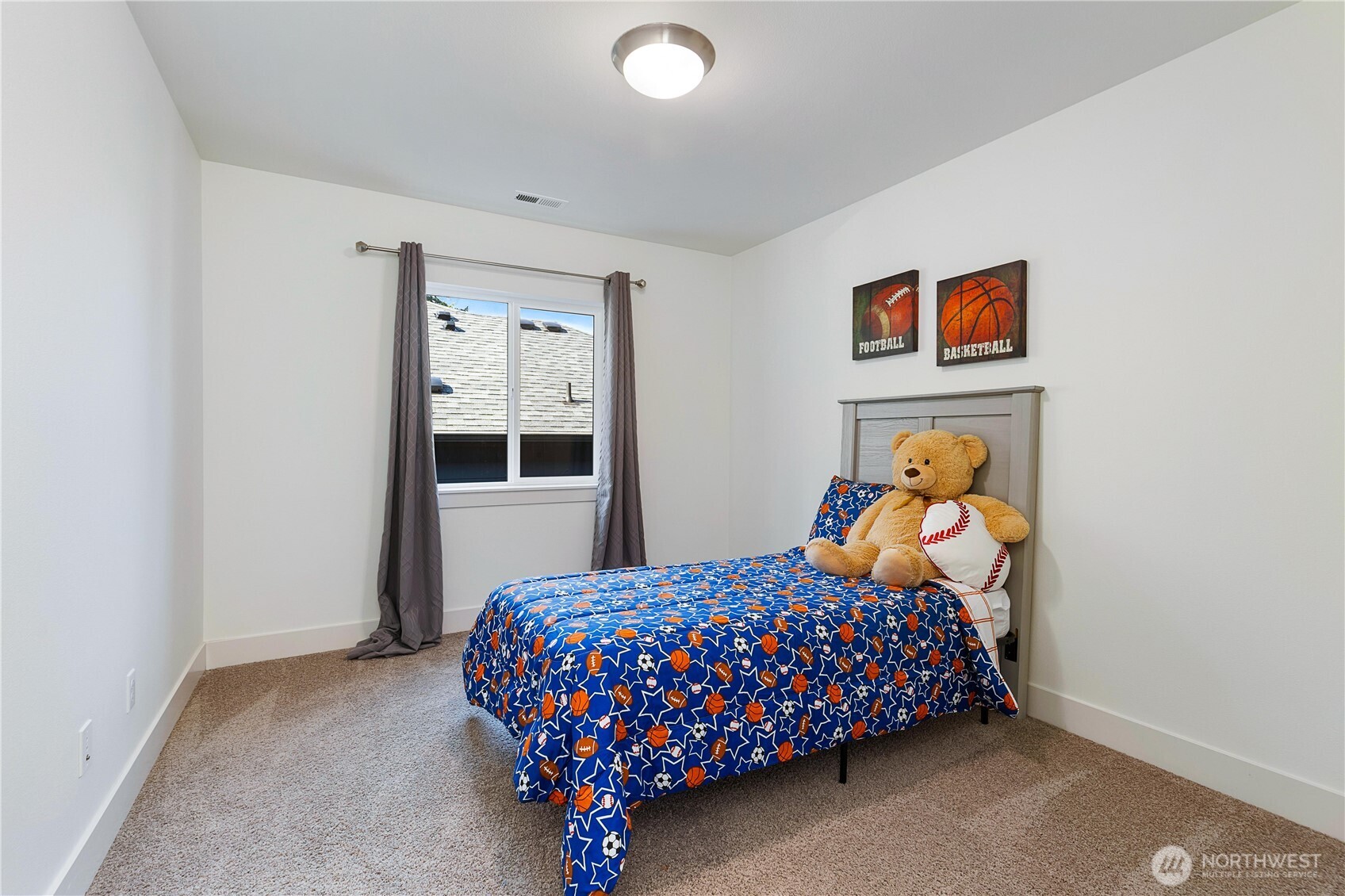 4214 223rd Place Southeast Bothell, WA 98021 - Photo 27 of 37 a bedroom with a bed and a window