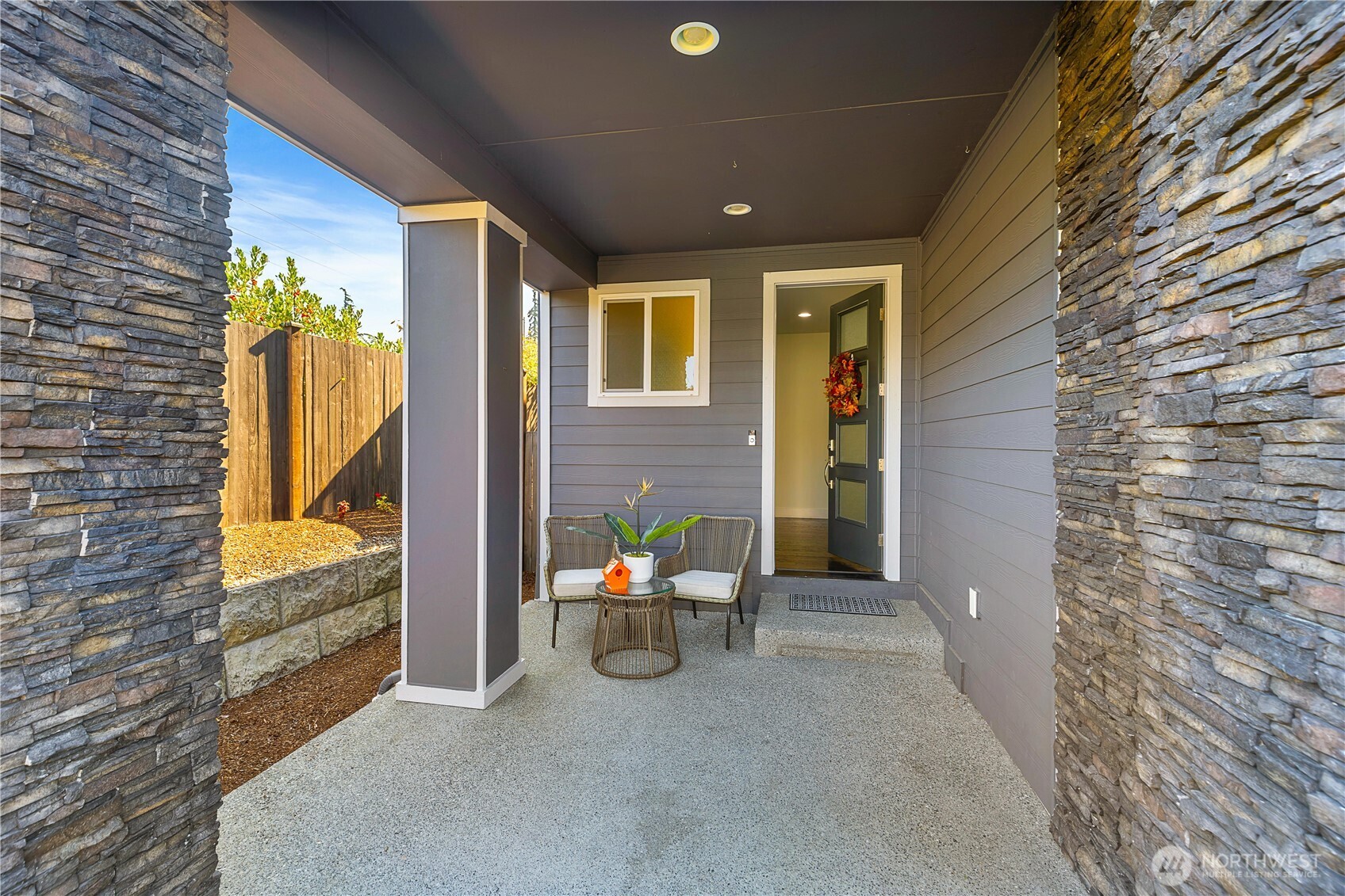 4214 223rd Place Southeast Bothell, WA 98021 - Photo 3 of 37 a backyard of a house with outdoor seating
