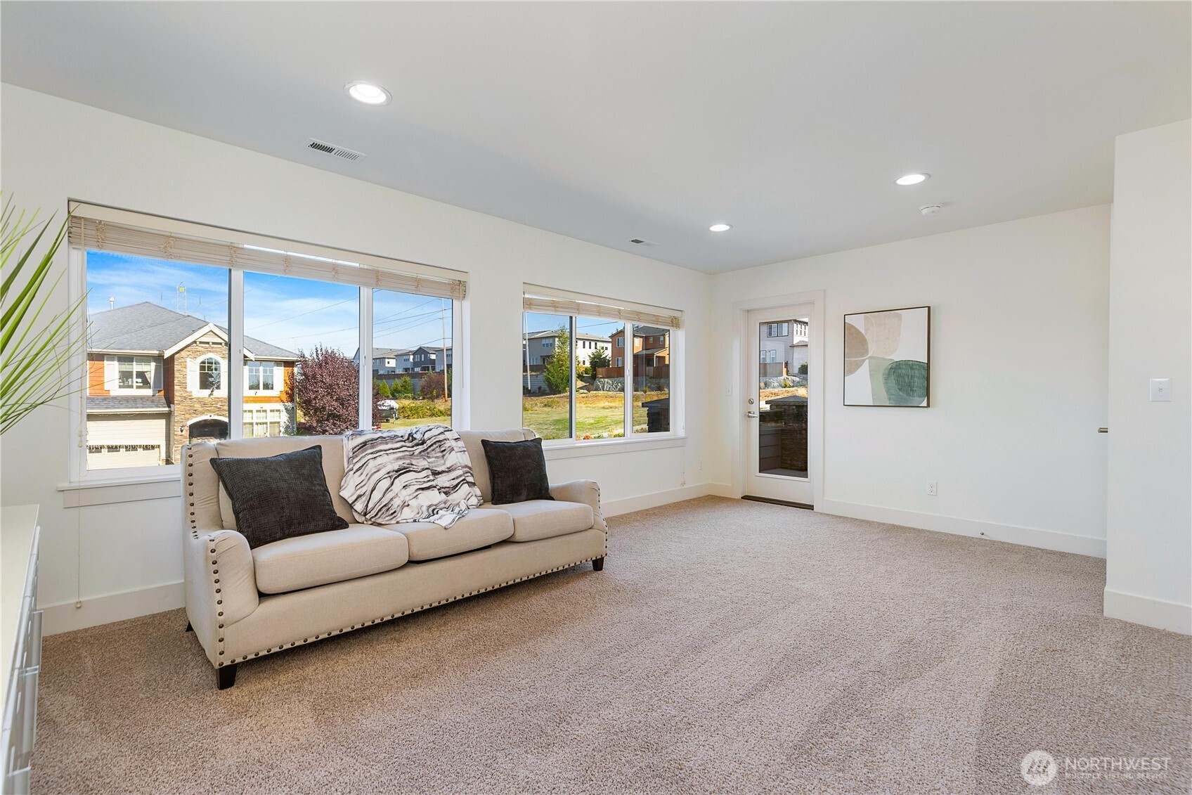 4214 223rd Place Southeast Bothell, WA 98021 - Photo 32 of 37 a living room with furniture and a large window