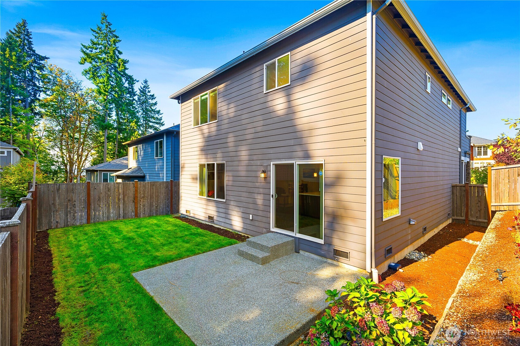 4214 223rd Place Southeast Bothell, WA 98021 - Photo 34 of 37 a view of backyard with a garden and deck