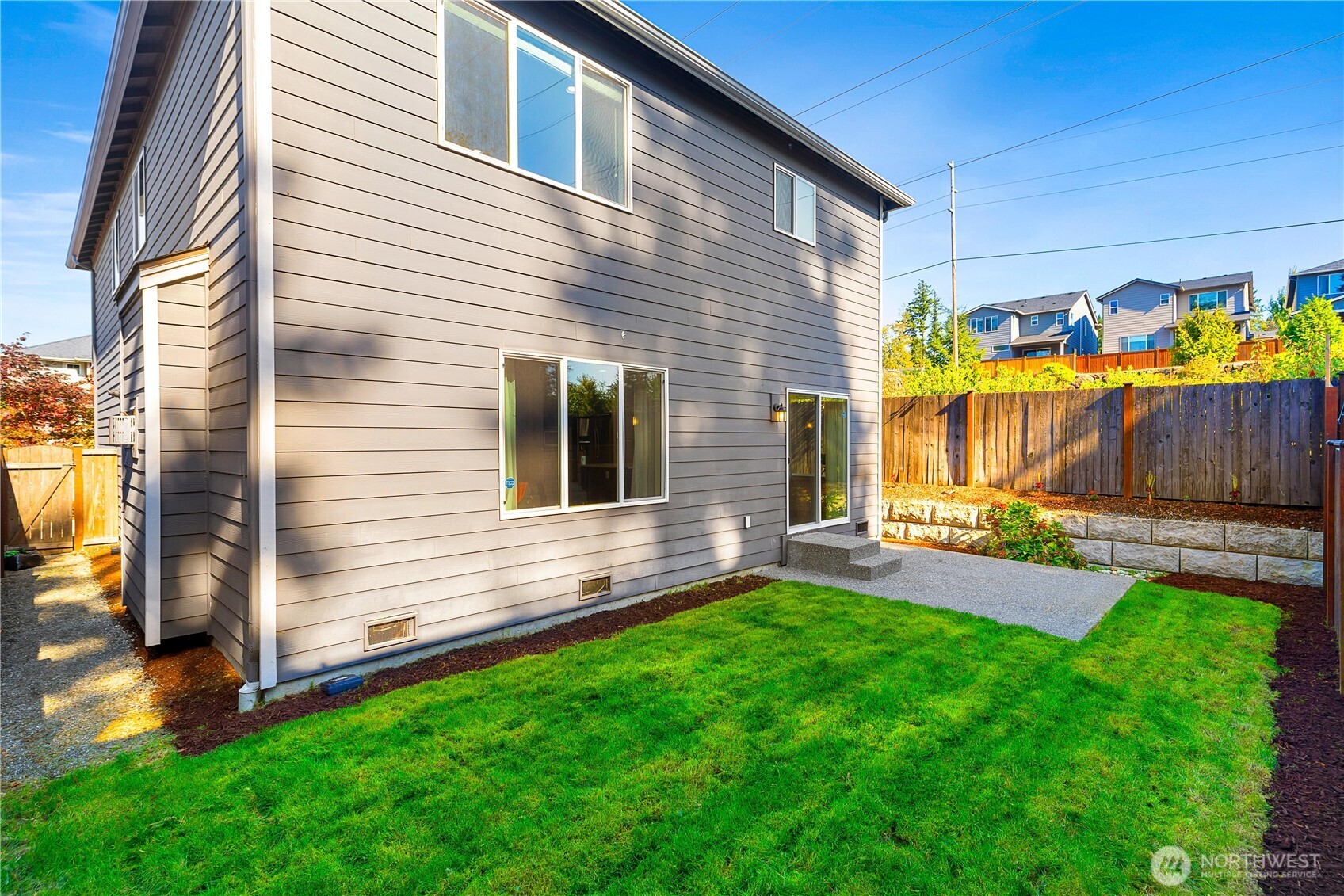4214 223rd Place Southeast Bothell, WA 98021 - Photo 35 of 37 a view of a house with a yard and furniture