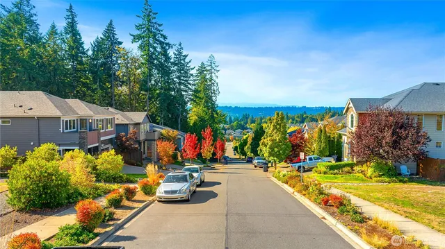 a view of a chairs and table in the patio