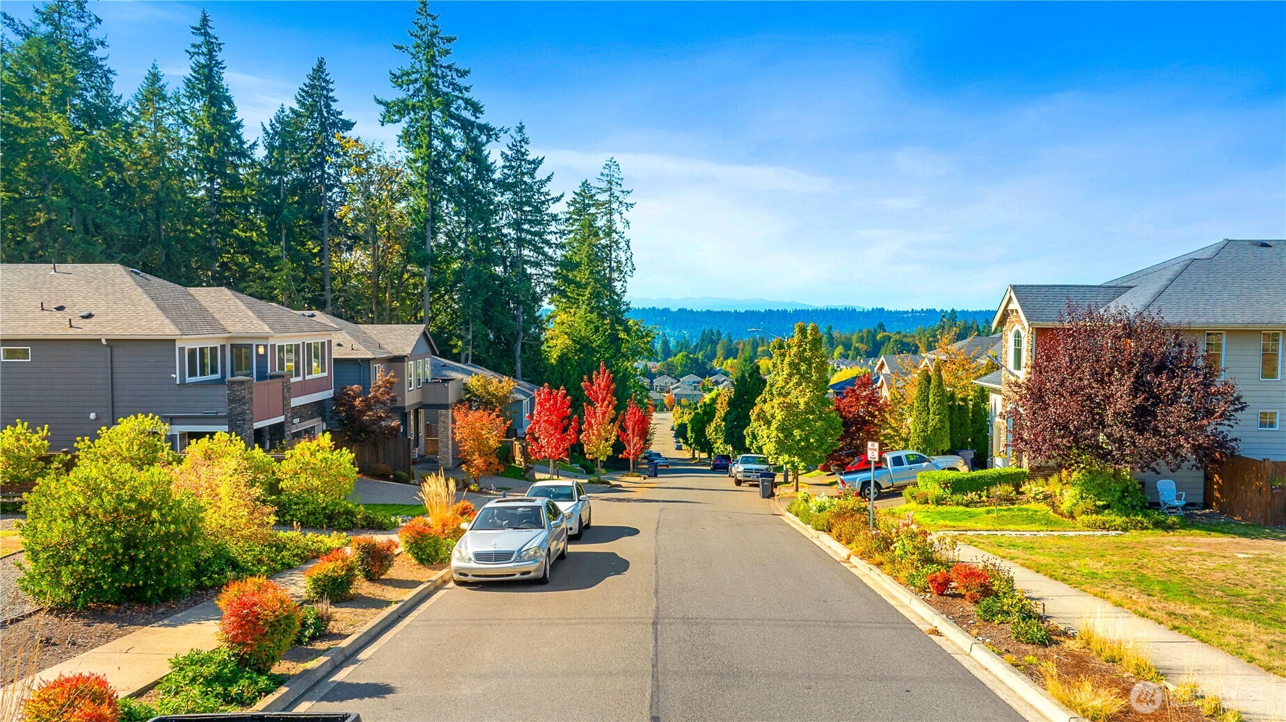 4214 223rd Place Southeast Bothell, WA 98021 - Photo 36 of 37 a view of a park with swings and slides