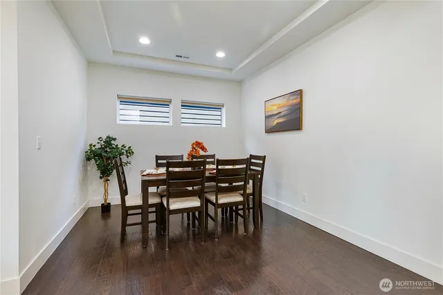 a view of a dining room with furniture