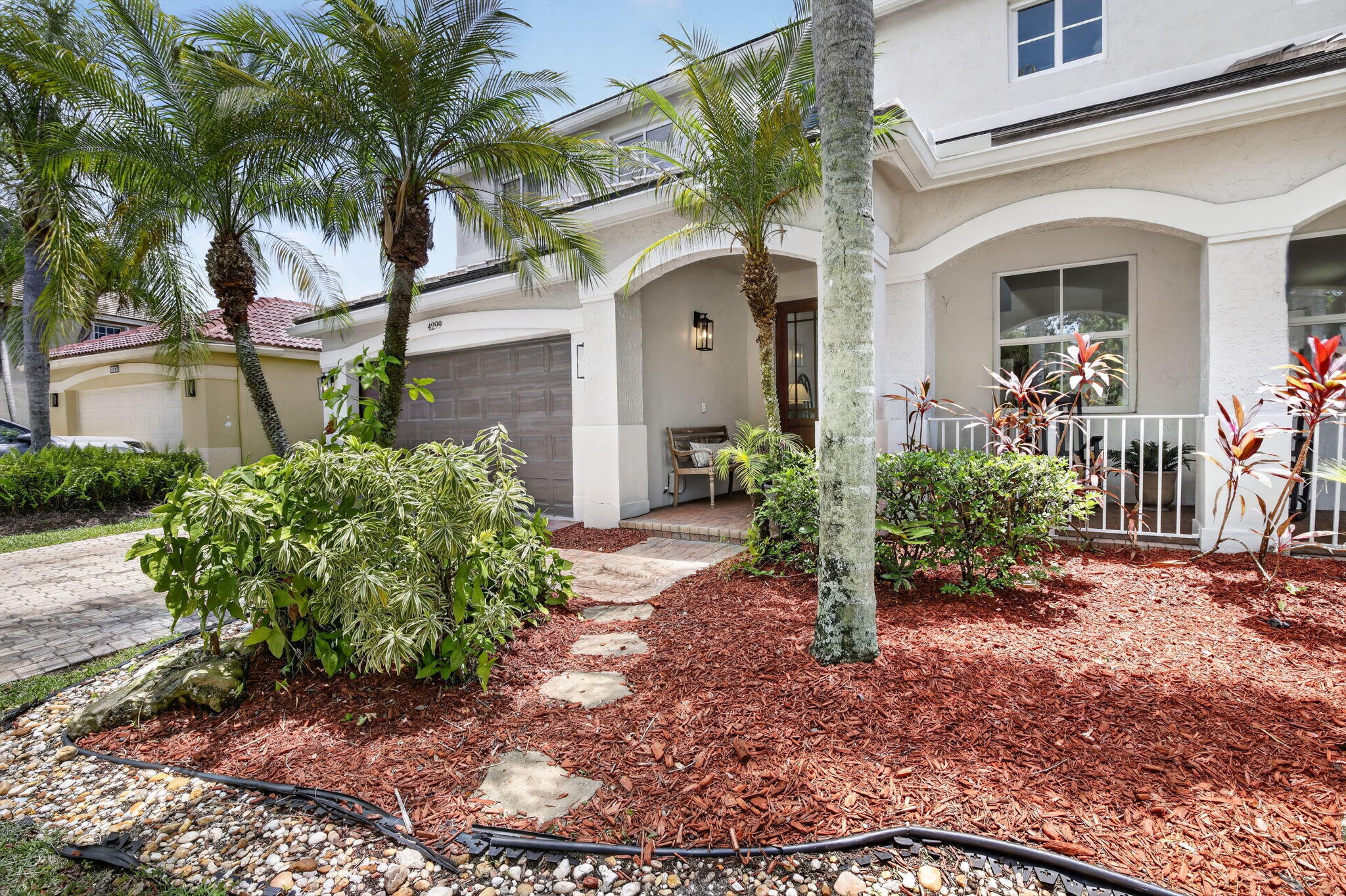 4299 Laurel Ridge Circle Weston, FL 33331 - Photo 73 of 103 a front view of a house with a yard