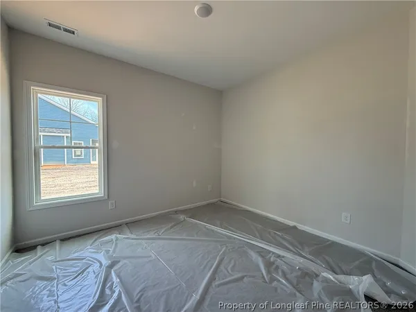 an empty room with a window