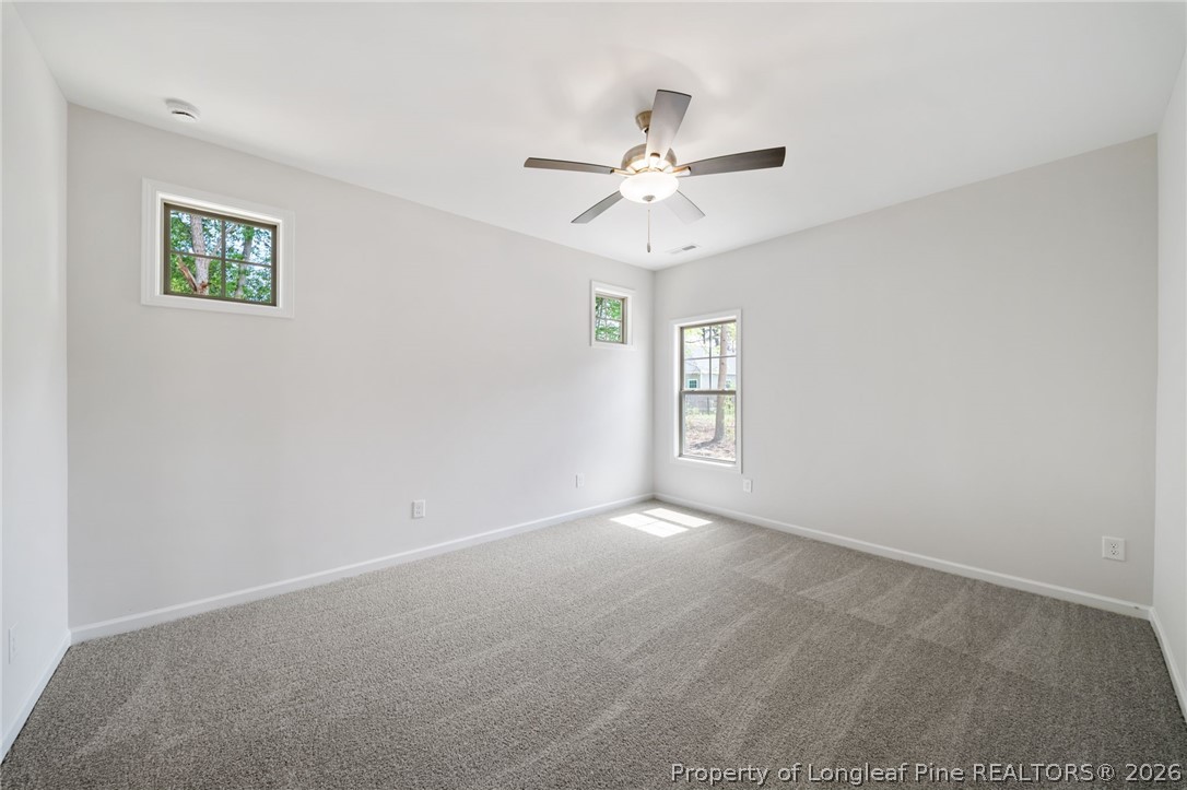 4038 Lofton Street Wade, NC 28395 - Photo 15 of 29 a view of an empty room with a window