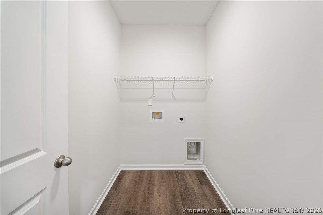 4038 Lofton Street Wade, NC 28395 - Photo 19 of 29 a view of small space with racks on the wall