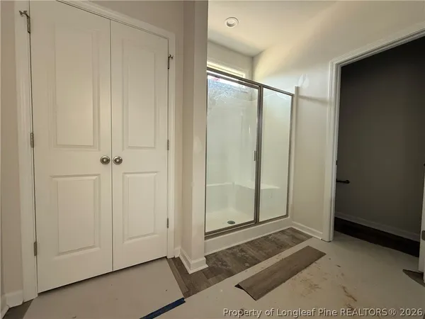 a view of a bathroom with a glass door