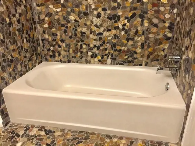 a bathroom with a bathtub