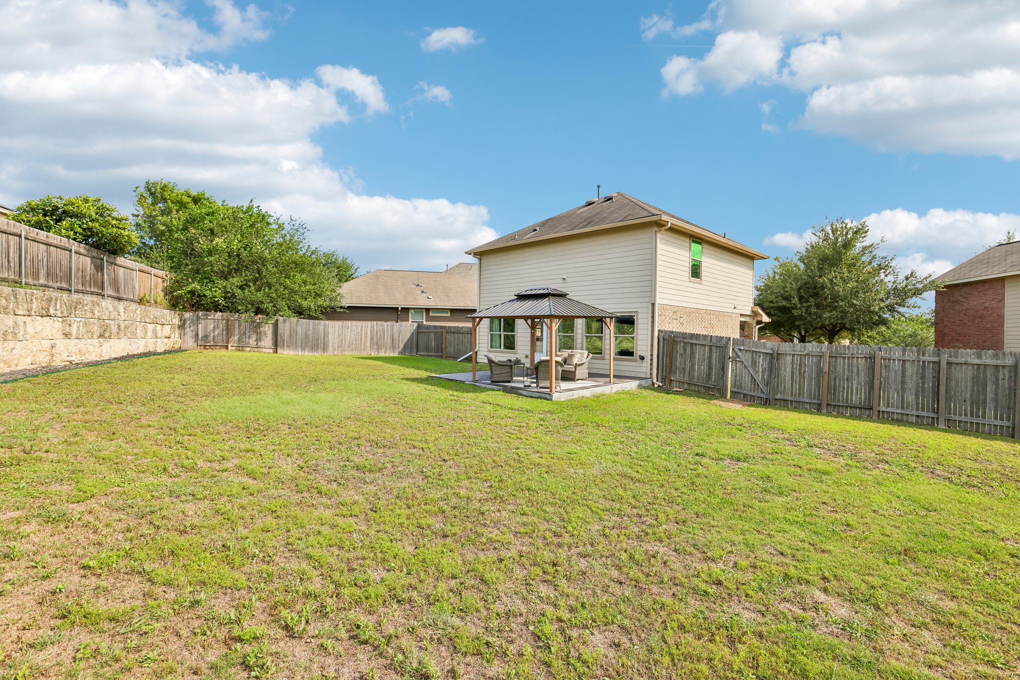 5508 Emma Thompson Way Austin, TX 78747 - Photo 4 of 34 Create your dream backyard with ample space for entertaining, gardening, play, relaxation, or whatever outdoor lifestyle you envision.