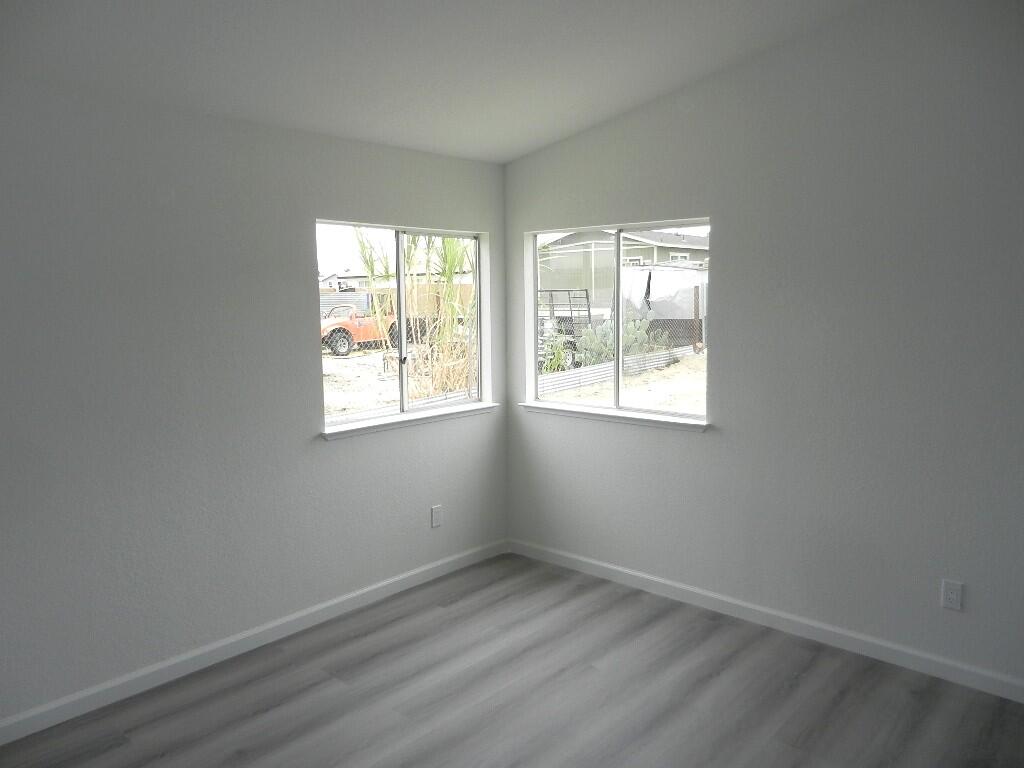98920 Surfside Avenue Mecca, CA 92254 - Photo 18 of 22 an empty room with a window