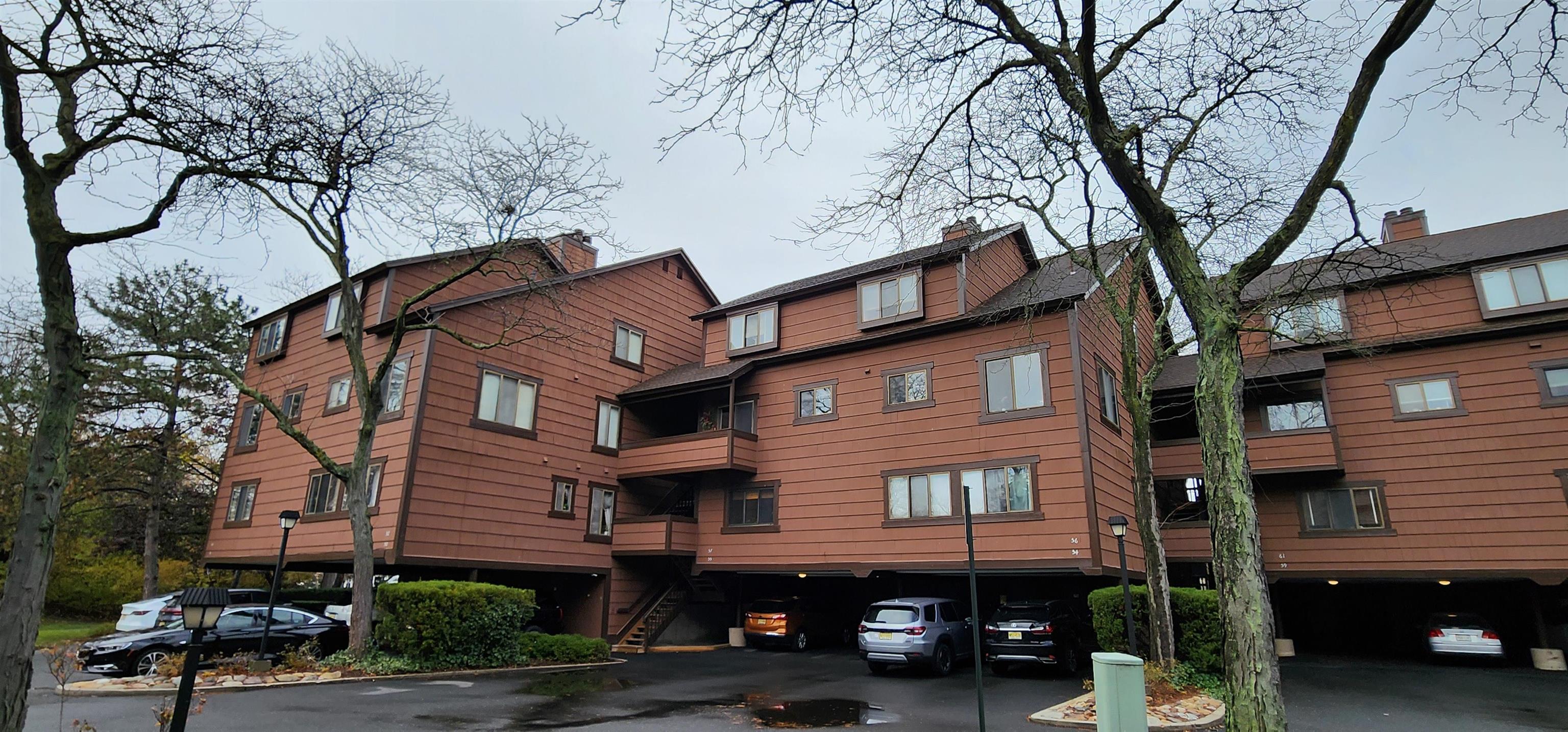 a view of a building with a street