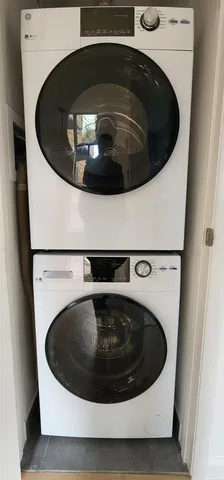 a kitchen with a sink a stove and refrigerator