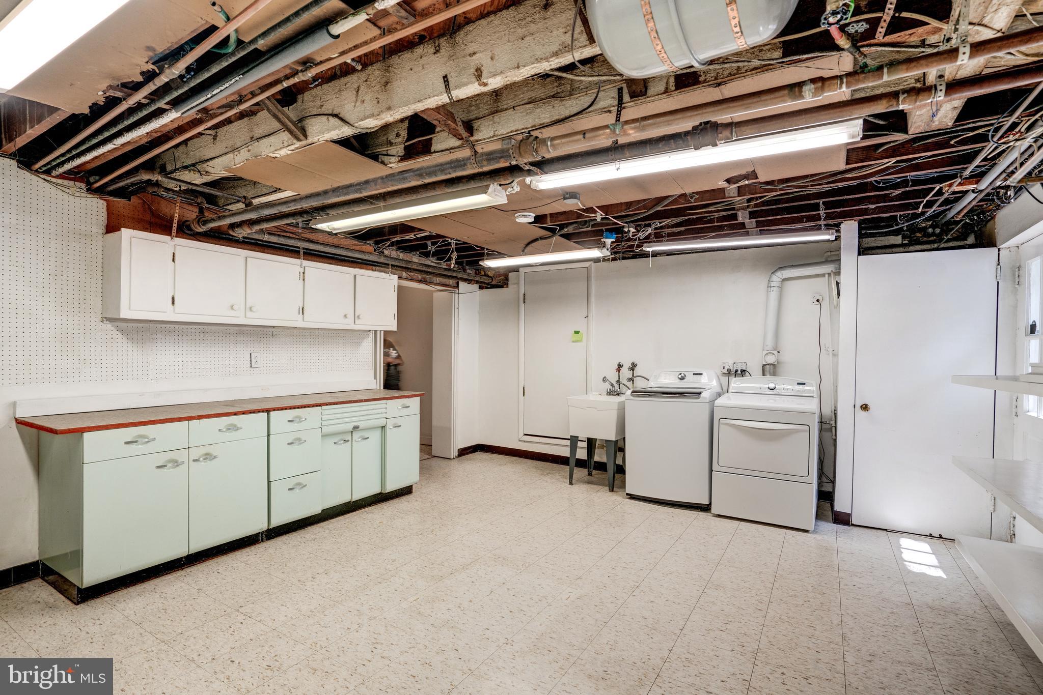 1400 Dennis Avenue Silver Spring, MD 20902 - Photo 32 of 42 Large partially finished Workroom & Laundry Room