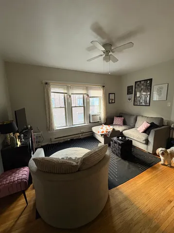 a living room with furniture and a couch