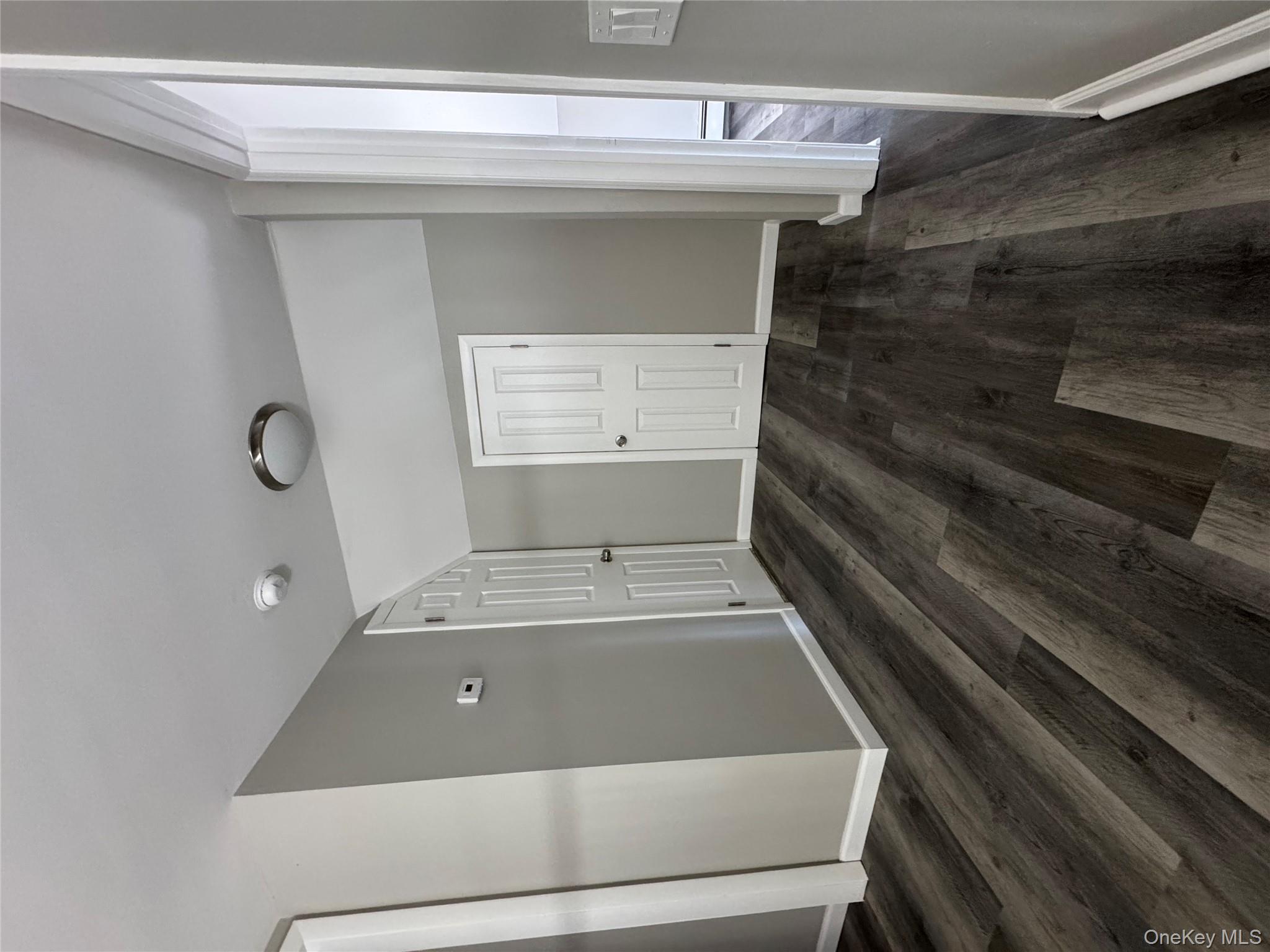 654 Milltown Road Danbury, CT 06811 - Photo 18 of 33 a view of an empty room and wooden floor