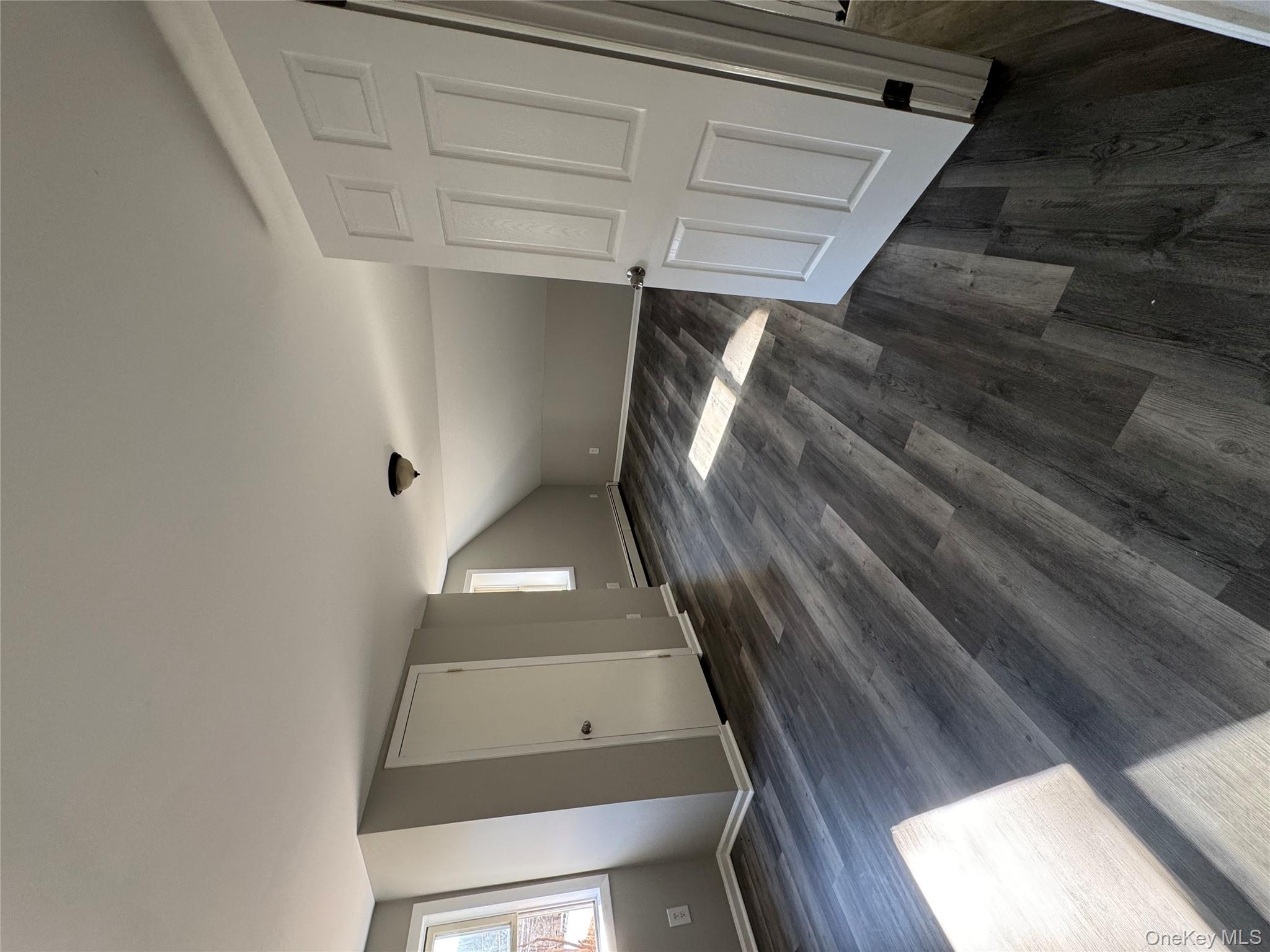 654 Milltown Road Danbury, CT 06811 - Photo 20 of 33 a view of empty room with wooden floor