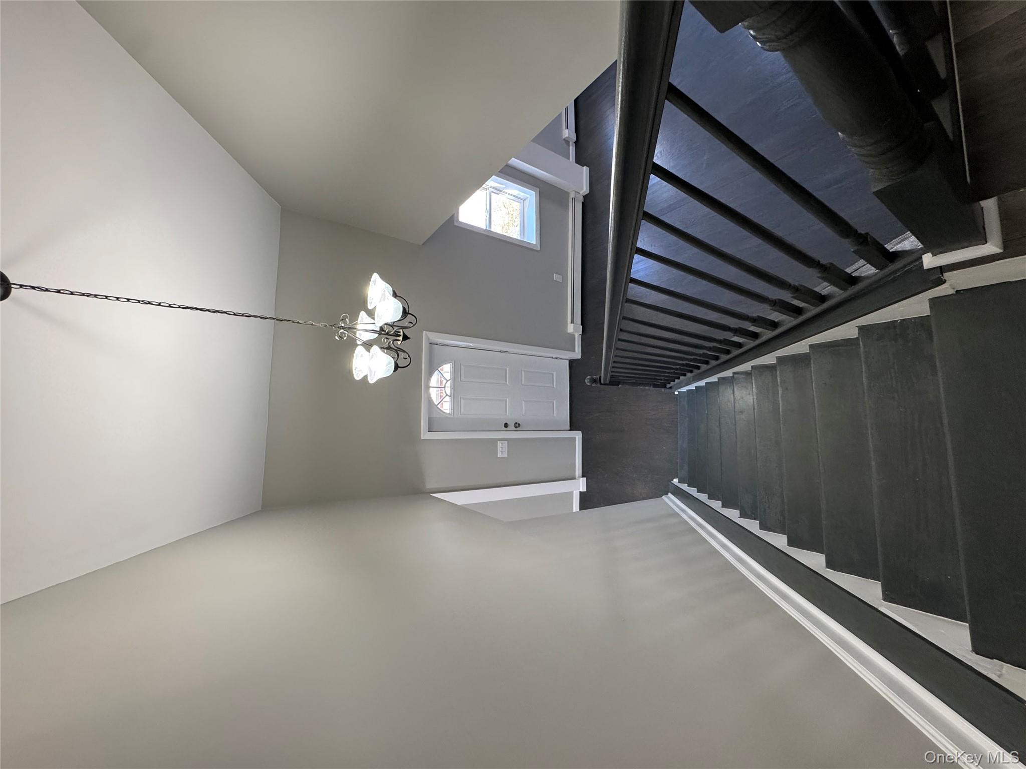 654 Milltown Road Danbury, CT 06811 - Photo 27 of 33 a view of a livingroom with stairs