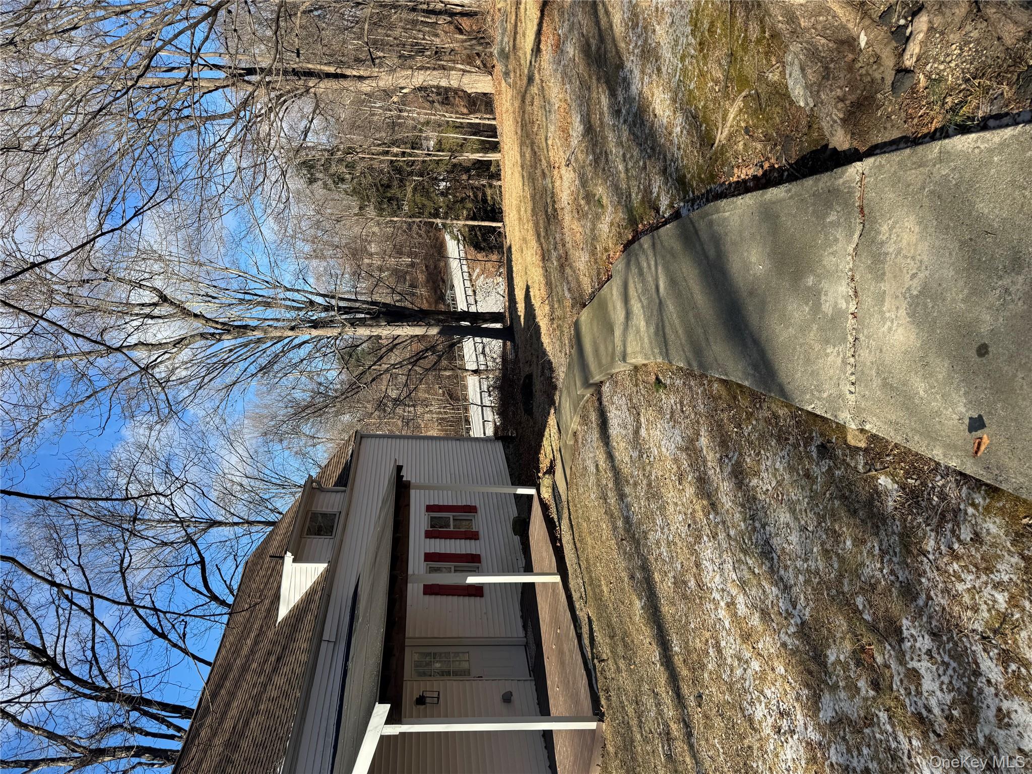 654 Milltown Road Danbury, CT 06811 - Photo 3 of 33 a backyard of a house