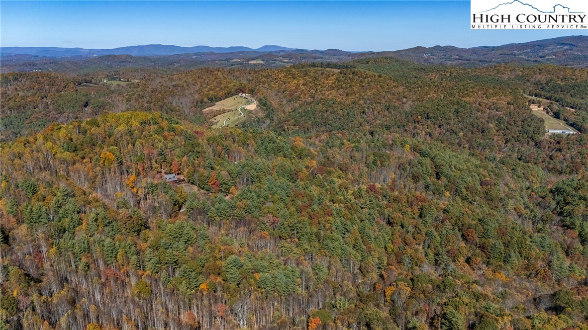 Valley Drive Jefferson, NC 28640 - Photo 14 of 18 a view of an aerial view of residential houses with outdoor space and mountain view