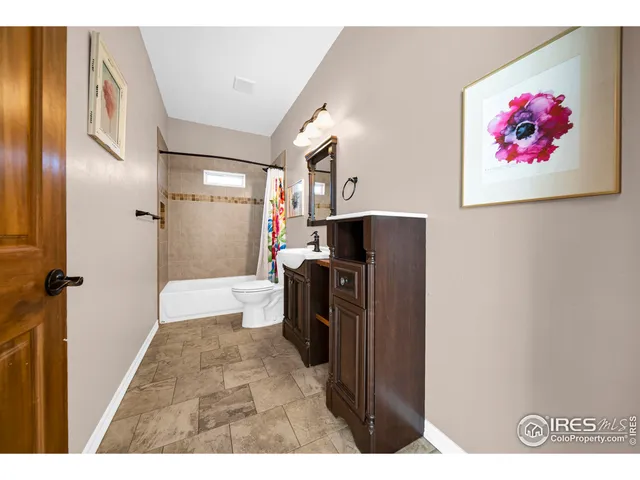a view of a kitchen from the hallway