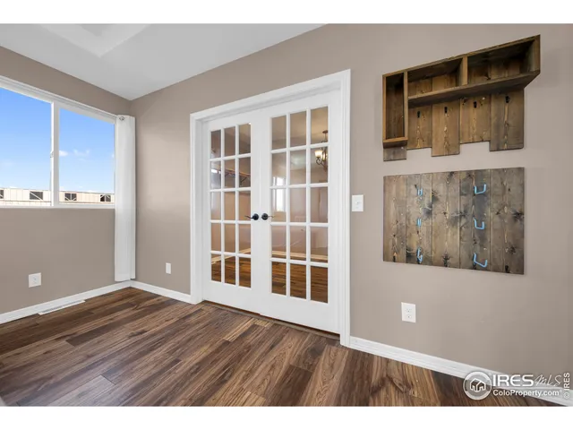a view interior of a house with wooden floor and windows