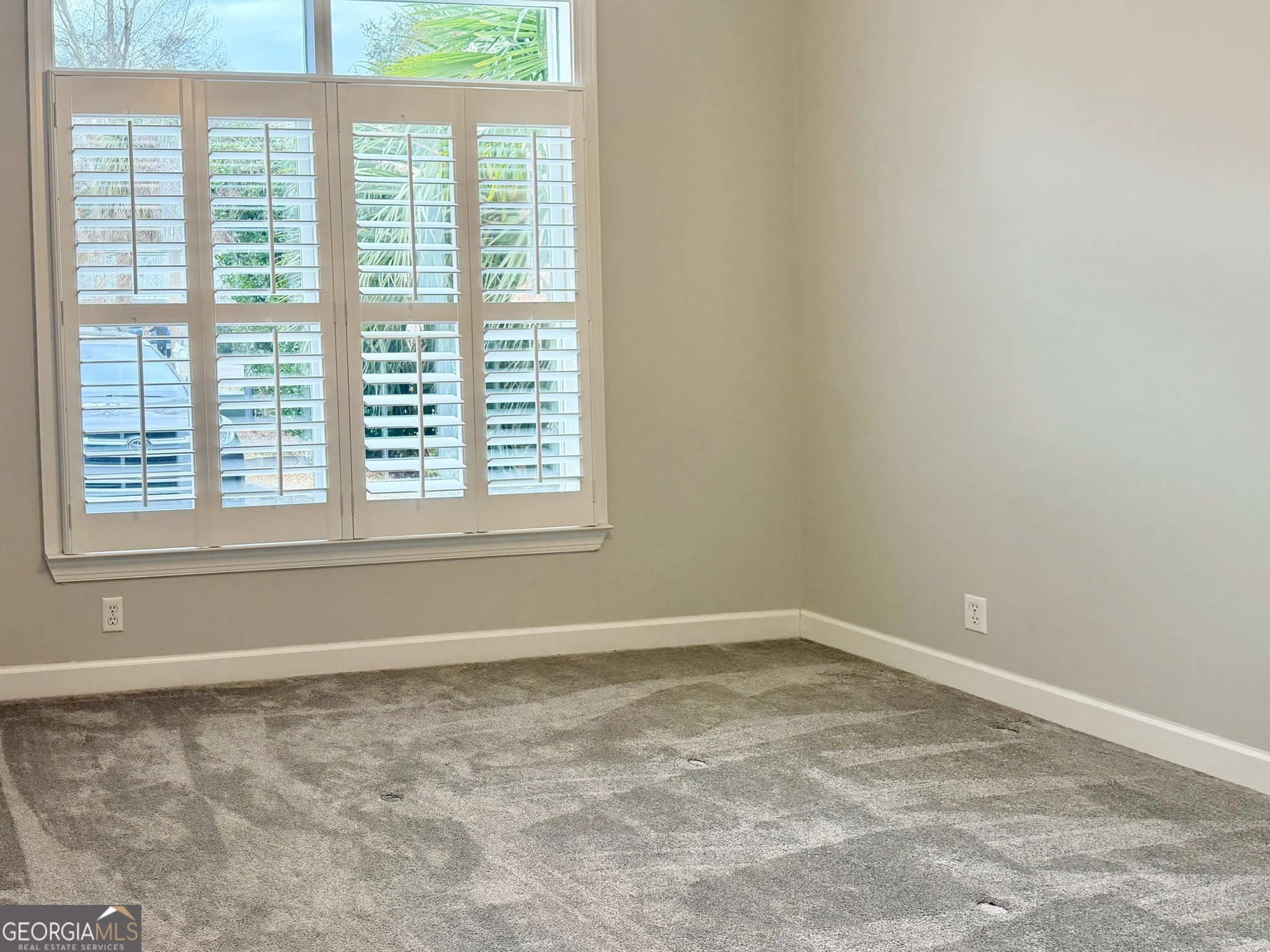 317 Commons Road St. Simons, GA 31522 - Photo 20 of 44 a view of empty room with window