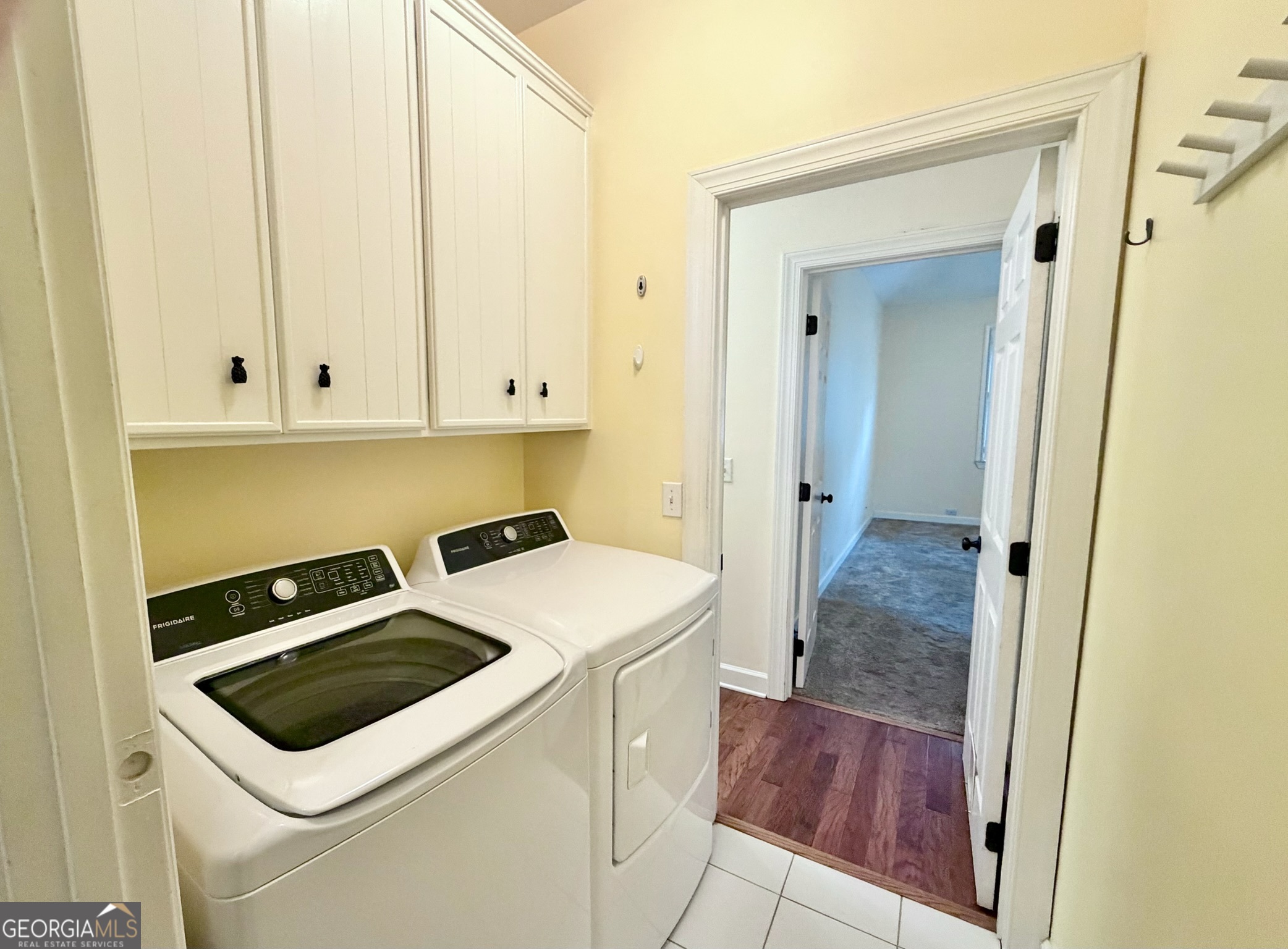 317 Commons Road St. Simons, GA 31522 - Photo 29 of 44 a utility room with dryer and washer