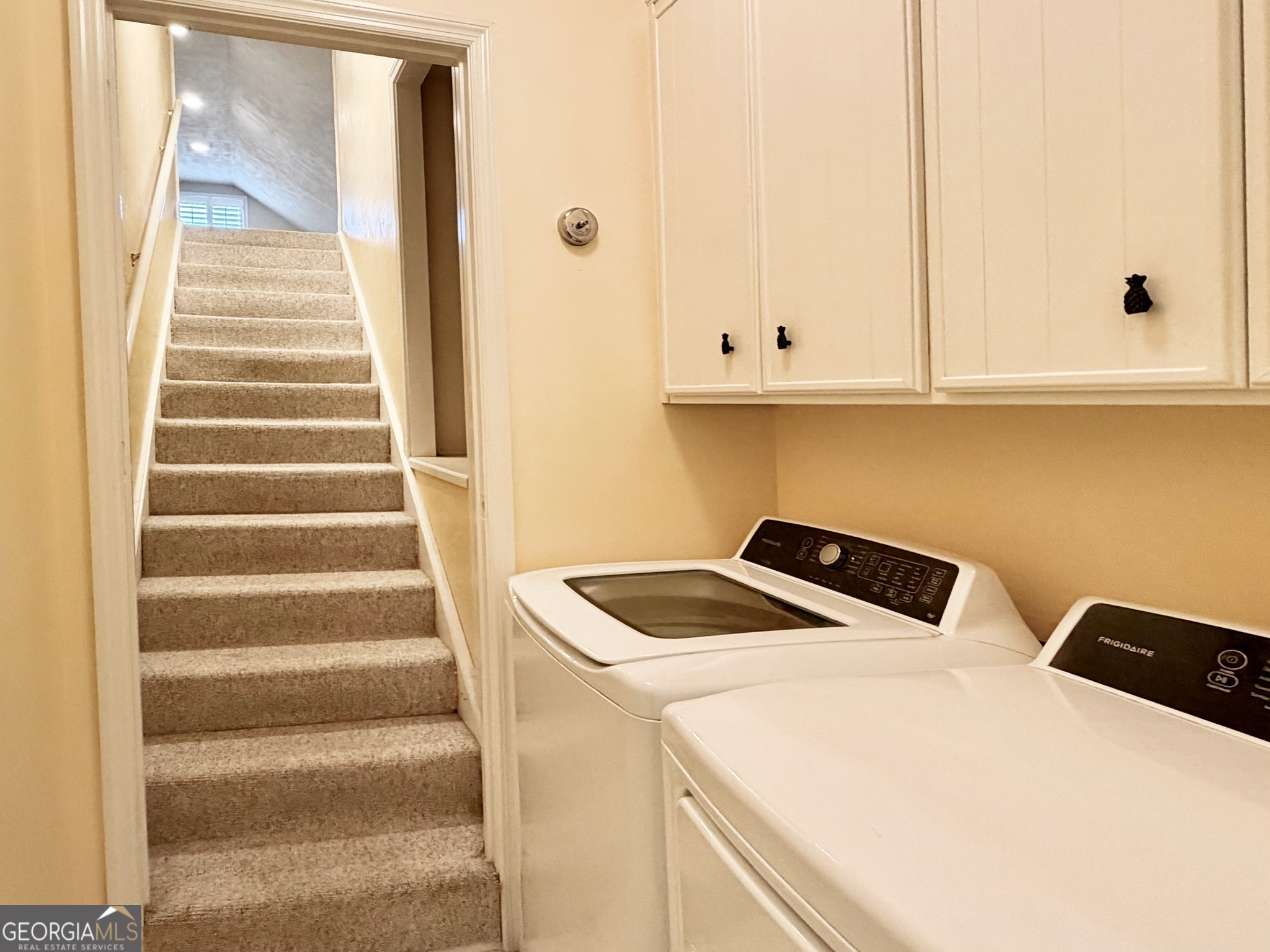 317 Commons Road St. Simons, GA 31522 - Photo 30 of 44 a utility room with dryer and washer