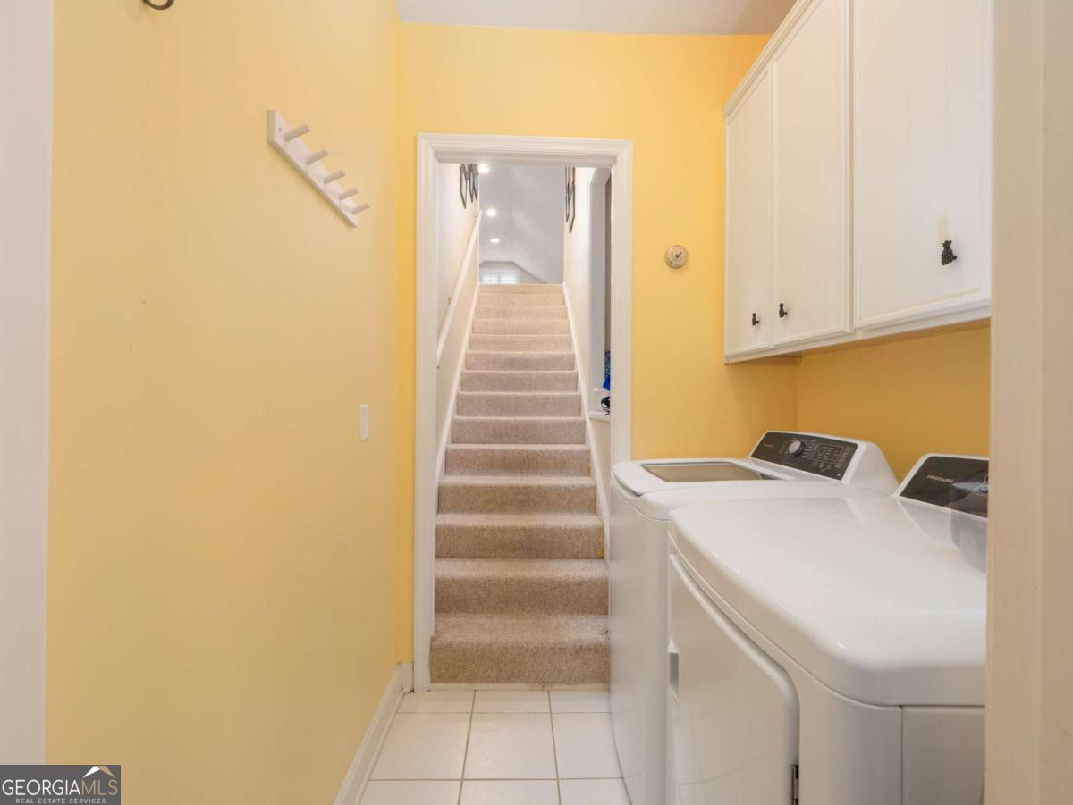 317 Commons Road St. Simons, GA 31522 - Photo 32 of 44 a utility room with dryer and washer