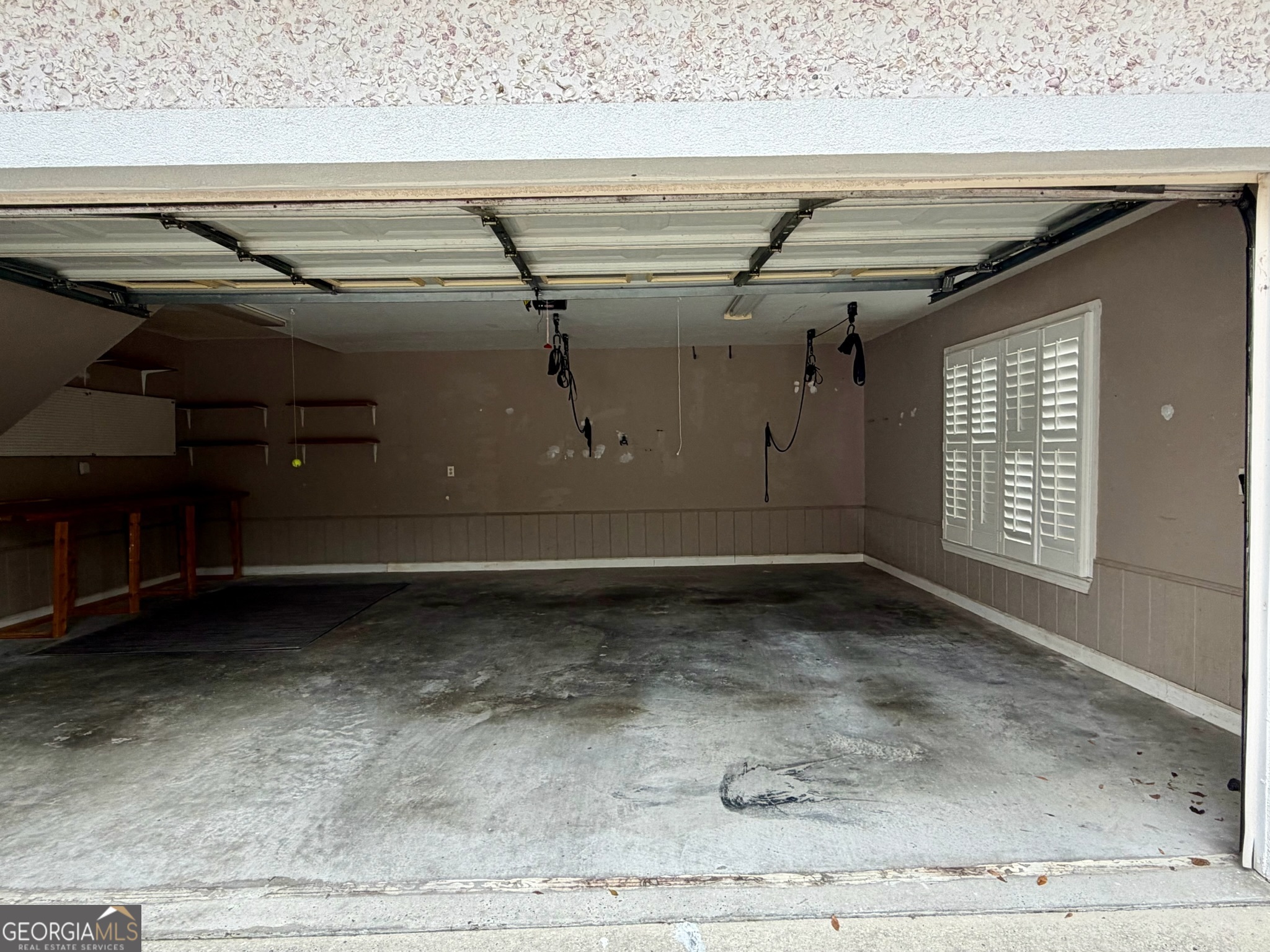 317 Commons Road St. Simons, GA 31522 - Photo 40 of 44 a view of a garage