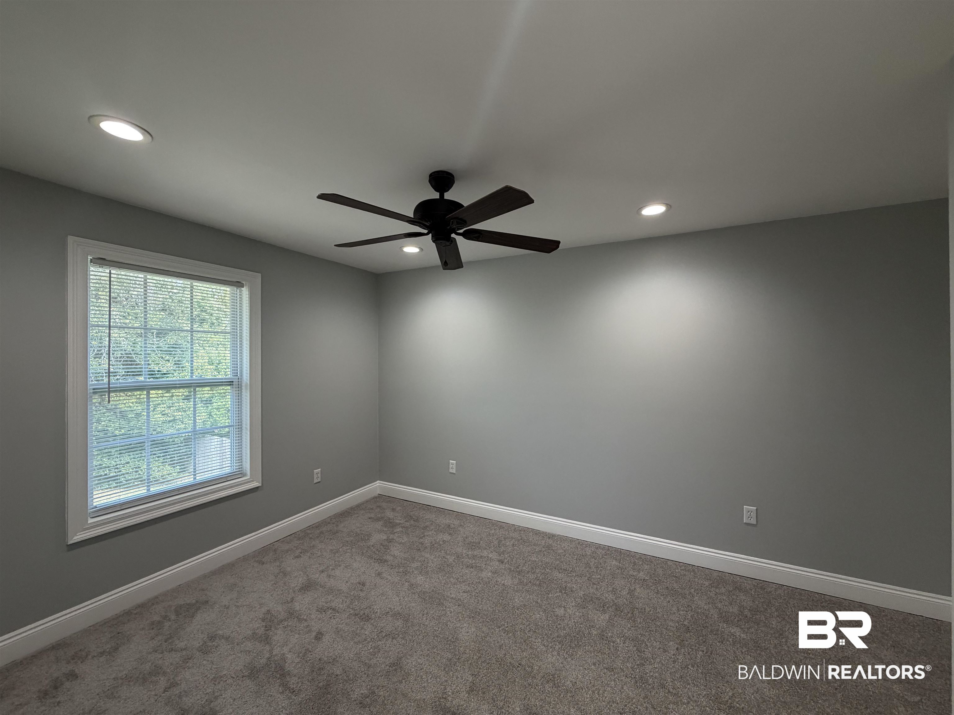 2454 Taylor Avenue Mobile, AL 36606 - Photo 20 of 24 Empty room with ceiling fan, carpet, and recessed lighting