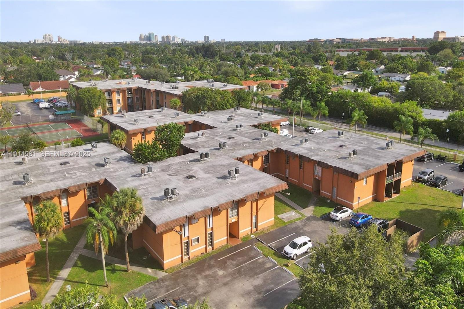 9459 Southwest 76th Street, Unit R7 Miami, FL 33173 - Photo 14 of 21 an aerial view of a house with a mountain