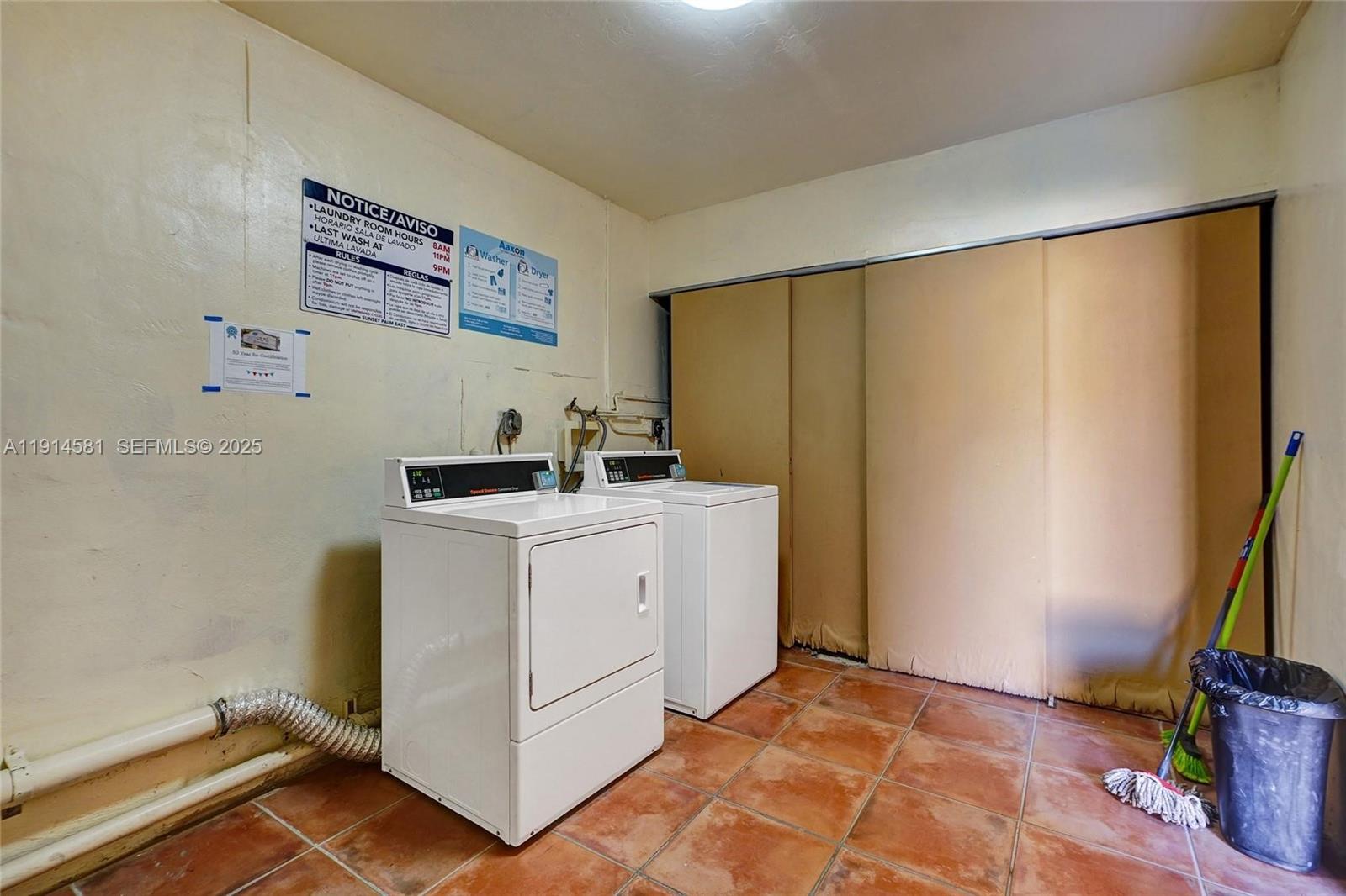 9459 Southwest 76th Street, Unit R7 Miami, FL 33173 - Photo 19 of 21 a room with a refrigerator and a flat screen tv