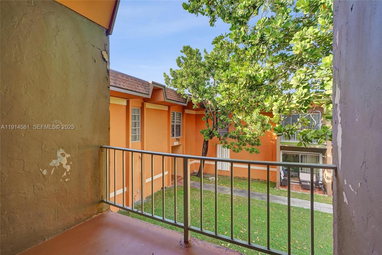 9459 Southwest 76th Street, Unit R7 Miami, FL 33173 - Photo 10 of 21 a view of a balcony