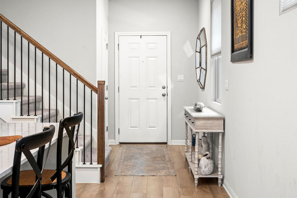 2417 Roosevelt Road Leander, TX 78641 - Photo 24 of 40 Entrance foyer featuring light wood finished floors and stairway